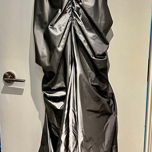 A long silky grey dress with a small long sleeve jacket. - Picture 3 of 5